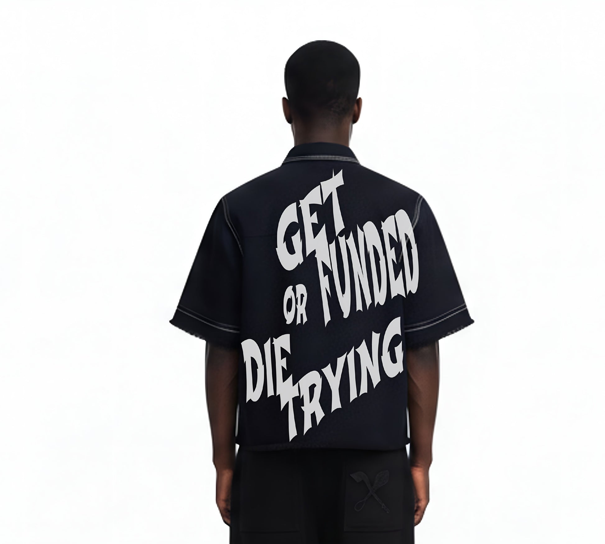 Person wearing a black shirt with white text on the back, standing against a white background